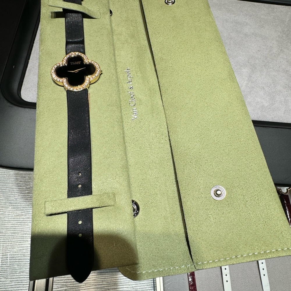 Black Leather Watch with Gold Accents